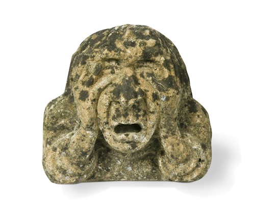 Lot 604 - A stone corbel of a man