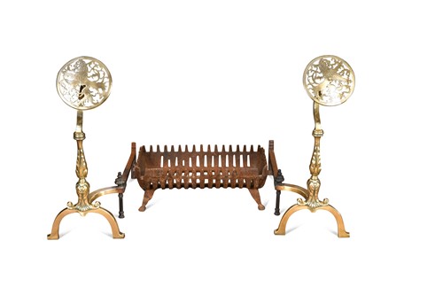 Lot 304 - A pair of brass fire dogs and a cast iron basket fire grate, 19th century