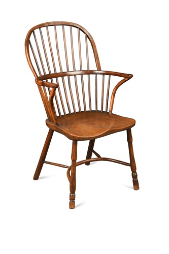 Lot 303 - A yew and elm stick back arm chair, early 19th century