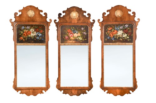 Lot 322 - Three walnut and painted fret cut wall mirrors, 20th century