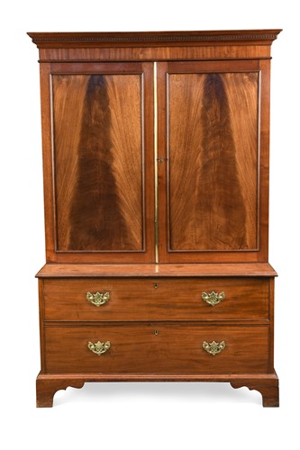 Lot 367 - A George III mahogany panelled cupboard on chest
