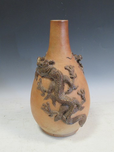 Lot 149 - A 19th/20th century Japanese brown-glazed...