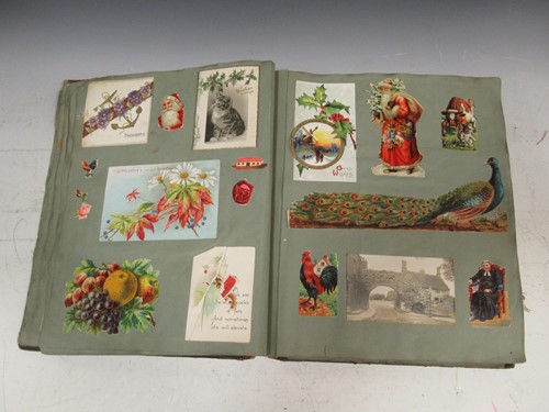 Lot 117 - A scrapbook containing a large quantity of...