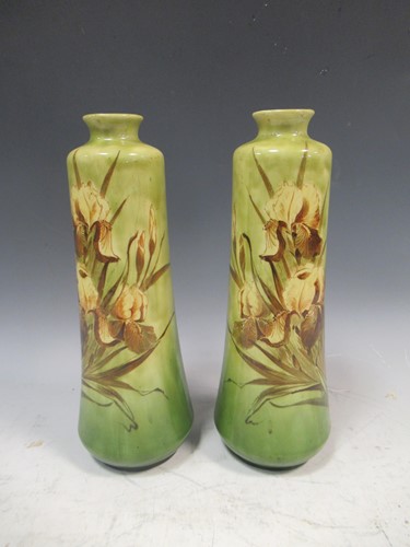 Lot 27 - A pair of Art Nouveau painted green vases 27cm...