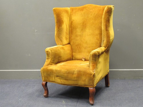 Lot 481 - A Queen Anne style wing armchair