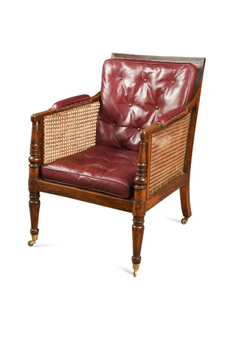 Lot 447 - A Regency mahogany library bergere armchair