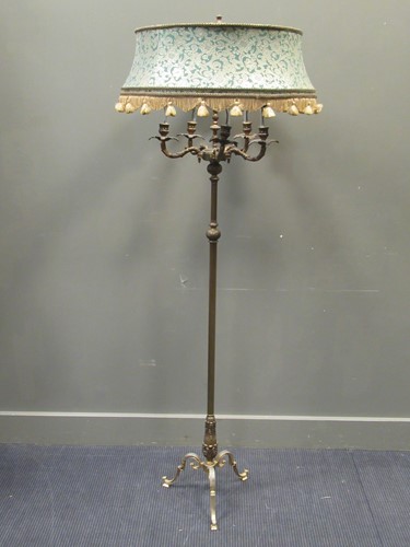 Lot 494 - An Edwardian brass floor standing five branch...