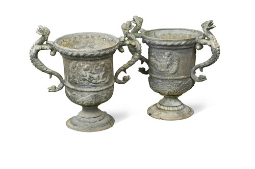 Lot 599 - A pair of Georgian two handled lead urns