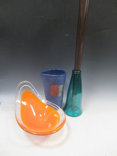 Lot 76 - A tall two-section glass vase, 73cm high; a...