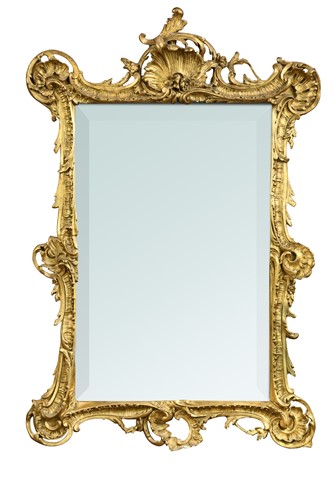 Lot 334 - A Rococo style gilt and gesso wall mirror, 19th century