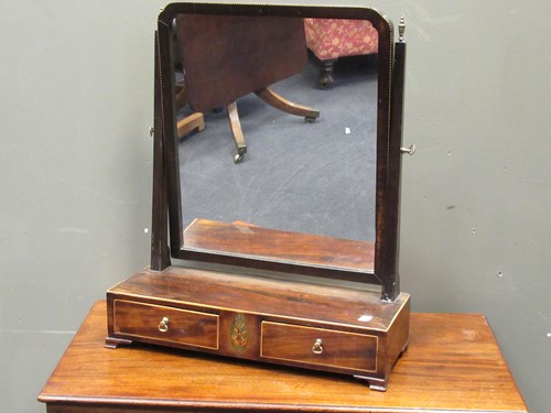 Lot 413 - A George IV mahogany toilet mirror with twin...