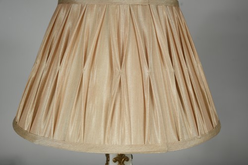 Lot 595 - A white onyx obelisk table lamp