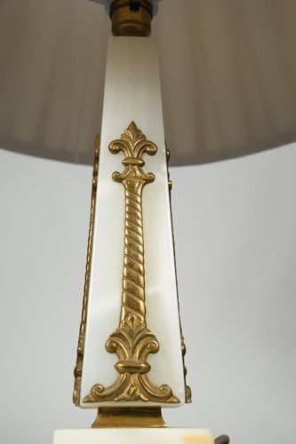 Lot 595 - A white onyx obelisk table lamp