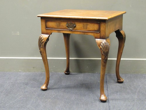 Lot 444 - A walnut single drawer lowboy table, 61.5 x 56...
