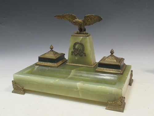 Lot 37 - An Empire style onyx and gilt brass inkwell...