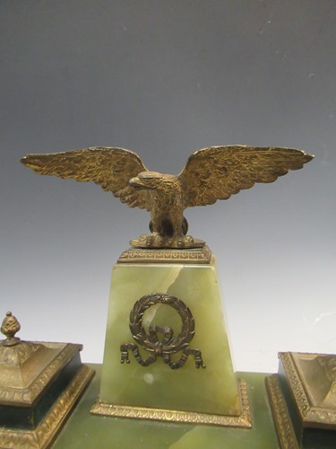 Lot 37 - An Empire style onyx and gilt brass inkwell...