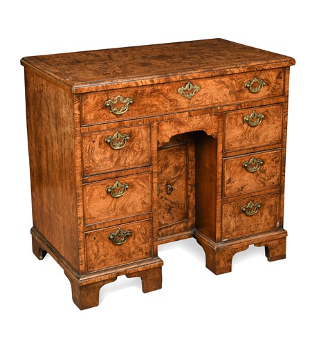 Lot 288 - A George II burr oak kneehole desk