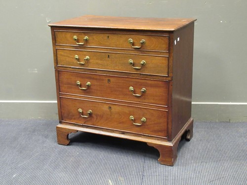 Lot 420 - A Georgian style mahogany cabinet, with two...