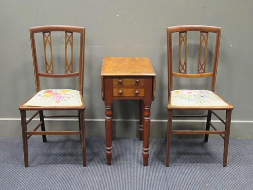 Lot 506 - A 19th century mahogany drop flap work table...