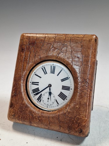 Lot 214 - A Goliath open faced pocket watch in a reptile...