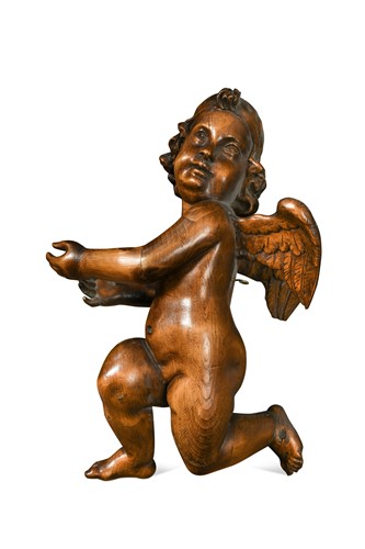 Lot 276 - A carved limewood figure of winged Cupid, probably 19th century