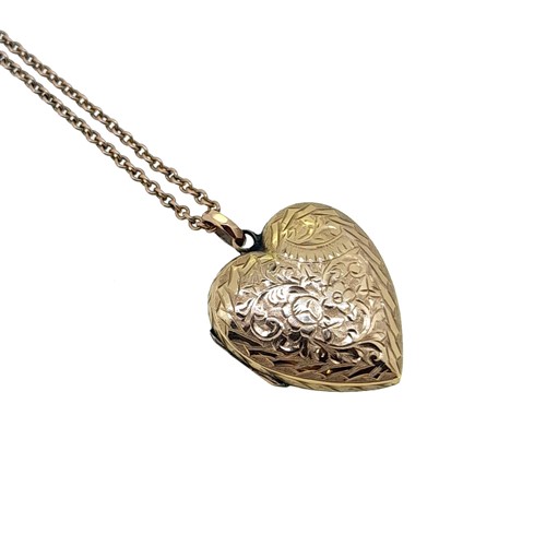 Lot 29 - An Edwardian 9ct gold hinged heart locket and chain