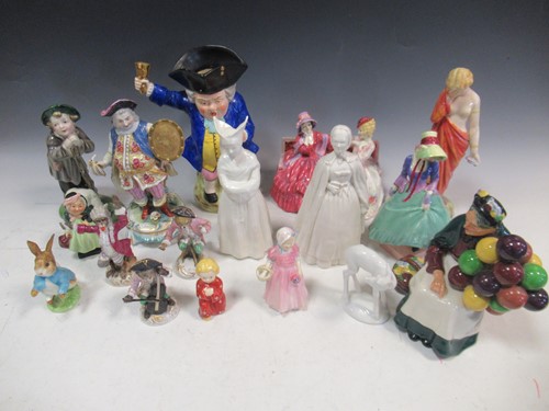Lot 50 - A collection of ceramic figures, to include a...
