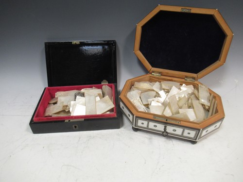 Lot 99 - Two boxes of mother of pearl counters,...