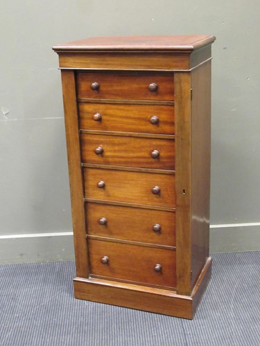 Lot 432 - A 19th century mahogany wellington chest...