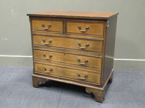 Lot 516 - A Georgian style mahogany chest of drawers on...