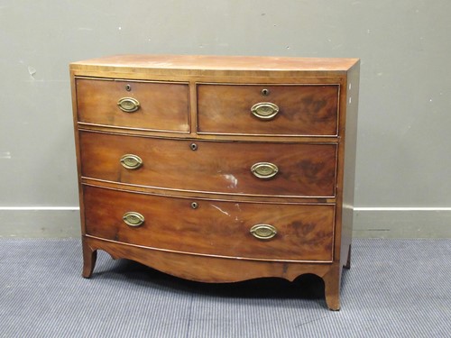 Lot 515 - A 19th century mahogany bow front chest of...