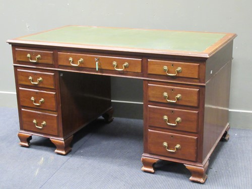 Lot 448 - A George III style mahogany pedestal desk...