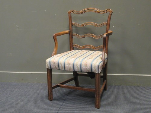 Lot 443 - A 19th century mahogany pierced ladder back...