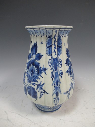 Lot 8 - A blue and white Delft tulip vase with flared...