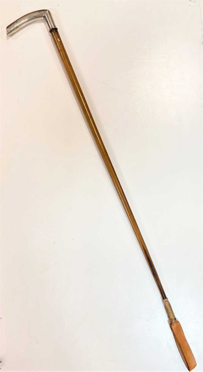 Lot 65 - A Chinese silver gilt-mounted riding stick,