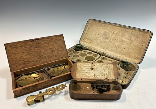 Lot 418 - A fruitwood cased coin scale, 18th century