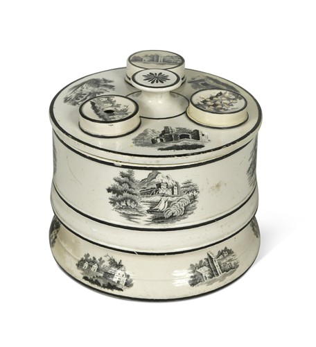 Lot 260 - An unusual creamware revolving ink stand, circa 1810