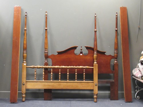 Lot 476 - A 20th century four poster bed, the broken...