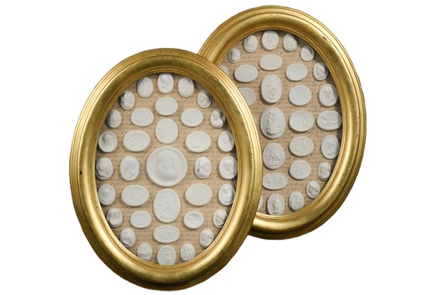 Lot 151 - A pair of plaster intaglio displays, in...
