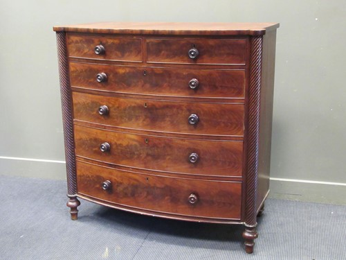 Lot 477 - A large 19th century bow front chest of...