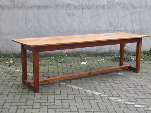 Lot 491 - A fruitwood refectory table with H-shaped...