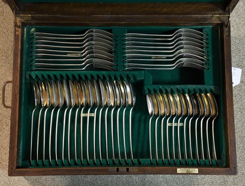 Lot 620 - A canteen containing a 59-piece set of George V silver flatware with 1 addition