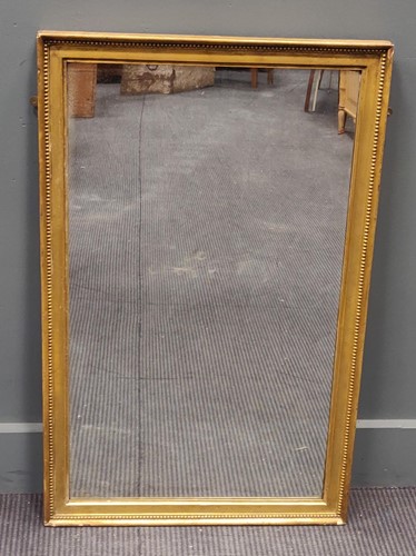 Lot 490 - A 19th century mirror in its original gilded...