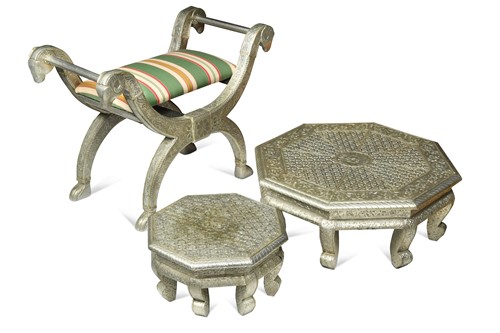 Lot 481 - A decorative white-metal mounted cross-frame stool, probably Indian, 20th century