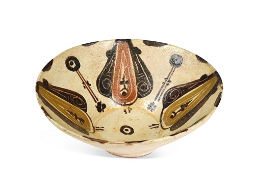 Lot 752 - A Kashan polychrome pottery bowl, possibly 13th/14th century