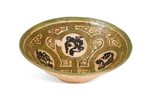 Lot 754 - A Kashan polychrome pottery bowl, possibly 13th/14th century