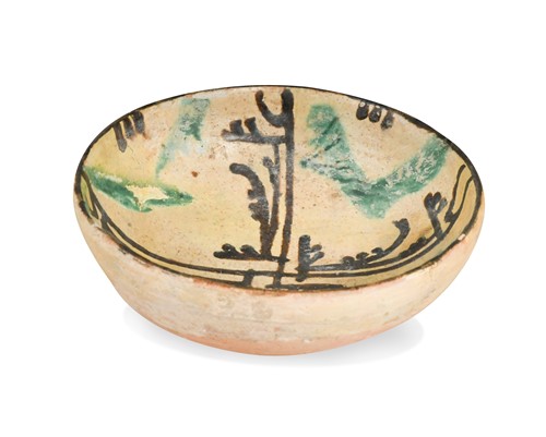 Lot 753 - A Kashan polychrome pottery bowl, possibly 13th century