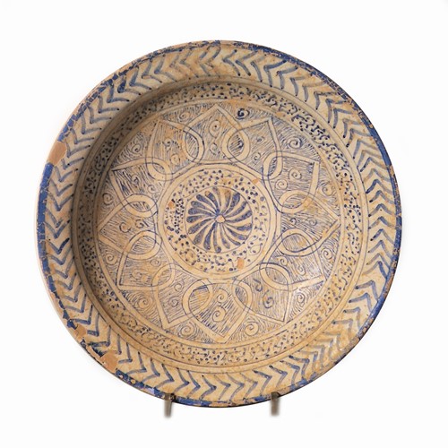 Lot 751 - A Persian blue painted circular dish, 13th/15th century