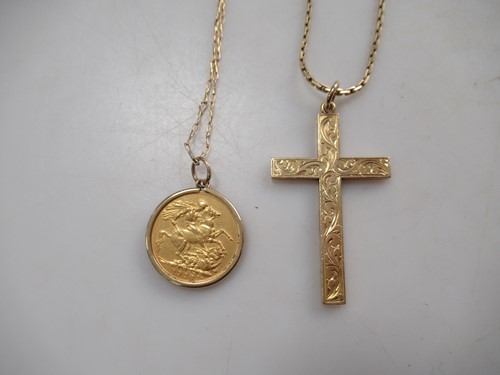 Lot 178 - A hallmarked 9ct gold cross pendant on a...