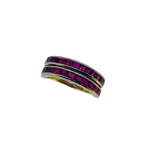 Lot 107 - An 18ct gold ruby half hoop style ring